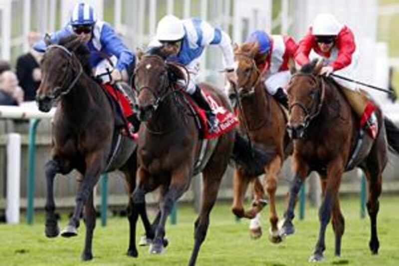 Ghanaati, left, falls behind to Sahpresa, ridden by Ted Durcan (No 4), in the Sun Chariot Stakes.