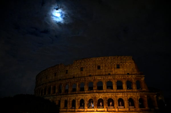 Lights at the Colosseum in Rome are switched off for the Earth Hour environmental campaign. EPA