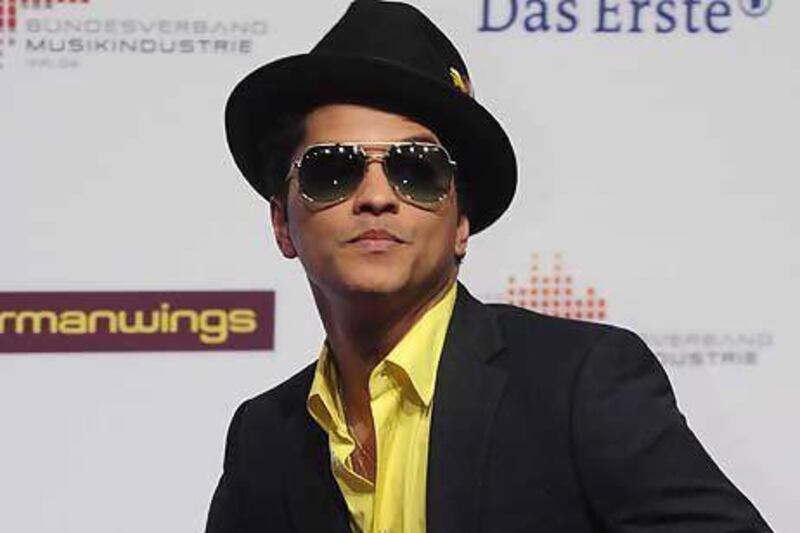 Bruno Mars, the chart-topping singer behind Grenade, is to play Dubai. John MacDougall / AFP