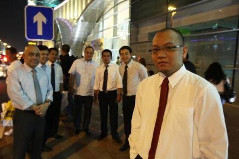 
DUBAI, UNITED ARAB EMIRATES Ð Sept 19: Gene Carl Tupas (right) with other members of the Philippine Legal Advocates (PLEAD) outside the Reef Mall in Deira Dubai. (Pawan Singh / The National) For News. Story by Ramona

