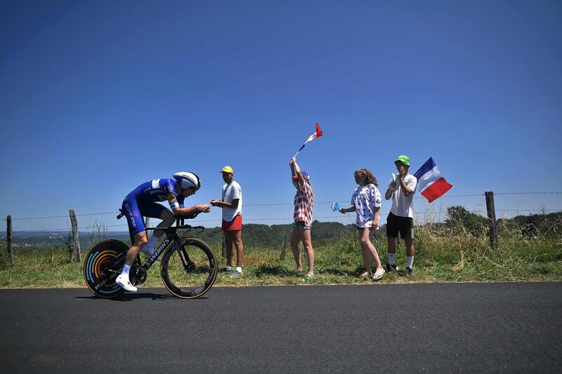 Argentina's Maximiliano Richeze rides past fans during the 13th stage - a 27.2km individual time-trial in Pau, on July 19, 2019.  AFP