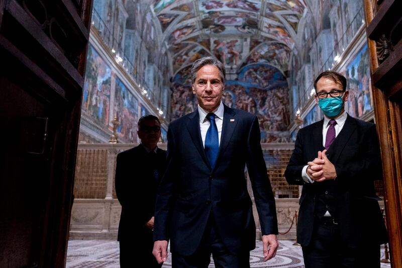 US Secretary of State Antony Blinken and Charge d'Affaires of the US Embassy to the Holy See Patrick Connell and tour guide Alessandro Conforti, leave the Sistine Chapel, in the Apostolic Palace, at the Vatican, ahead of a meeting with Pope Francis and Archbishop Paul Gallagher, as part of a three-nation tour of Europe. AFP