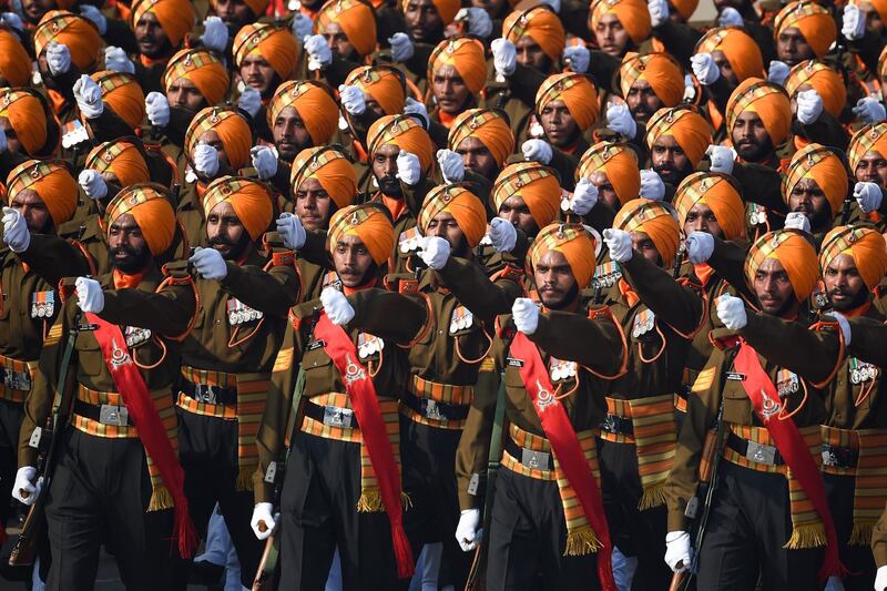 Army soldiers march along Rajpath during the Republic Day parade in New Delhi.  AFP
