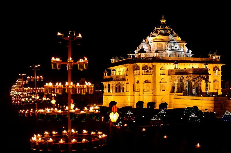 The Akshardham Mandir is seen illuminated with some 10,000 oil lamps on the eve of Diwali festival, in Gandhinagar, some 30 kms from Ahmedabad, India. AFP
