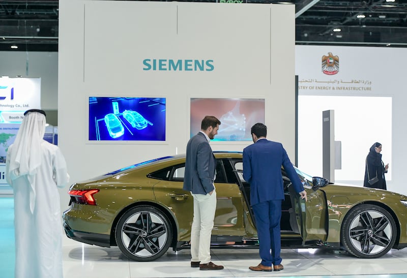 The Siemens stand at the Electric Vehicle Innovation Summit at Abu Dhabi National Exhibition Centre. All pictures by Khushnum Bhandari / The National
