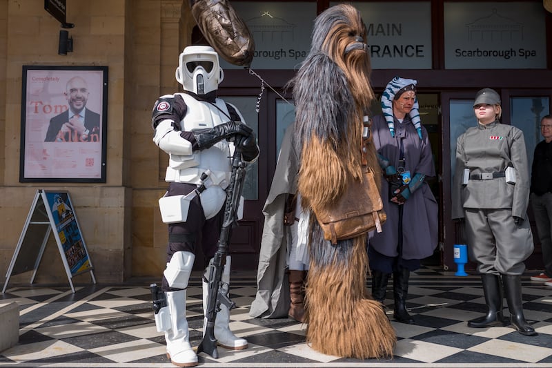 A Stormtrooper, Chewbacca, Ashoka and an Imperial Army general from Star Wars