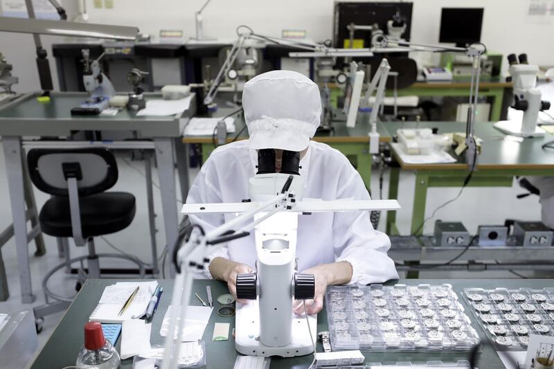 A technician assembles parts of mechanical movements of a Grand Seiko brand watch manufactured by Seiko Watch at the Morioka Seiko Instruments factory. All photos by Kiyoshi Ota / Bloomberg