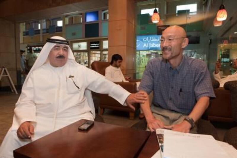 UAE - Dubai - July 31 - 2011:  Hamad Mutawa (left) and professor Fukuhara Teruyuko, during an interview at Manar Mall.  Mutawa was awarded the Japenses Order of the Rising Sun. ( Jaime Puebla - The National Newspaper )