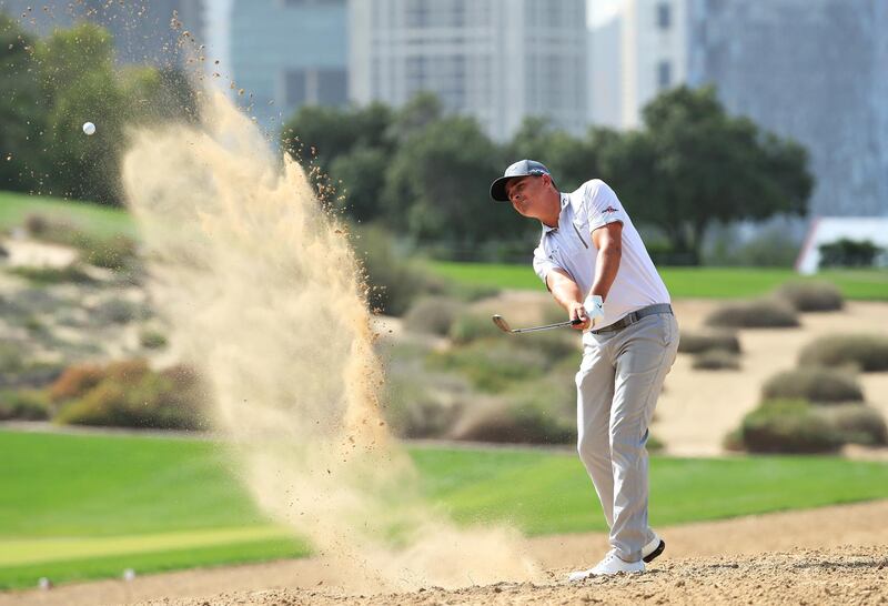 Christiaan Bezuidenhout of South Africa plays his second shot on the second hole. Getty