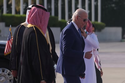 US President Joe Biden walks to board a plane following an Arab summit, at King Abdulaziz International Airprot, in Jeddah, Saudi Arabia, on July 16, 2022. Reuters