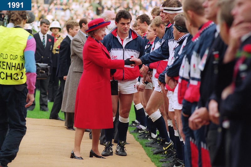 1991: England captain Will Carling introduces the queen to the England team before the Rugby World Cup Final against Australia at Twickenham.