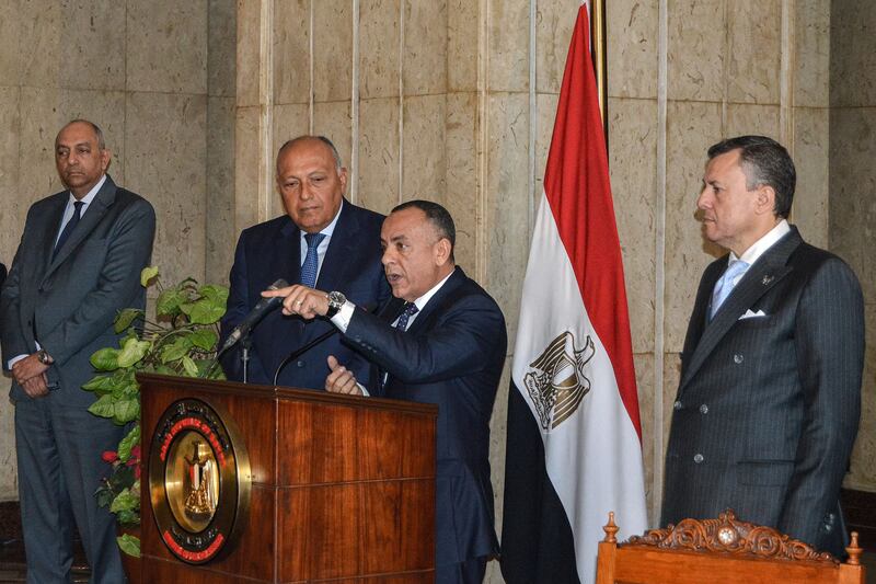 Mr Shoukry, second left, and Mr Issa, right, look on as Mr Waziri speaks during the handover ceremony, at the Foreign Ministry headquarters in Cairo. AFP