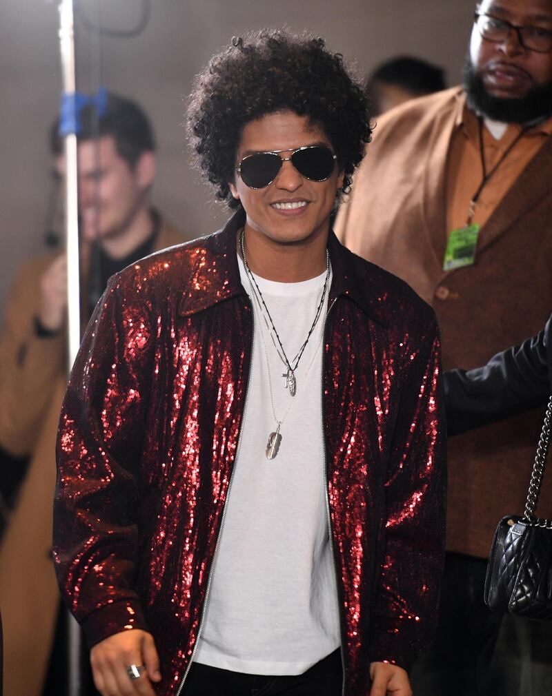 Singer Bruno Mars arrives in the press room during the 60th Annual Grammy Awards on January 28, 2018, in New York. / AFP PHOTO / Don EMMERT