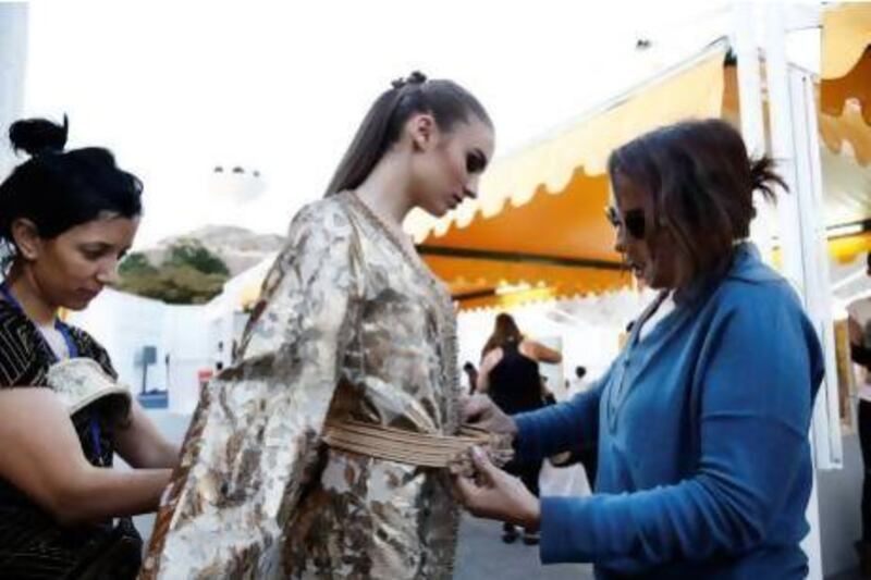 The designer Zhor Rais, right, showed her 36-piece kaftan collection, Muscat Fashion Week. Courtesy Muscat Fashion Week