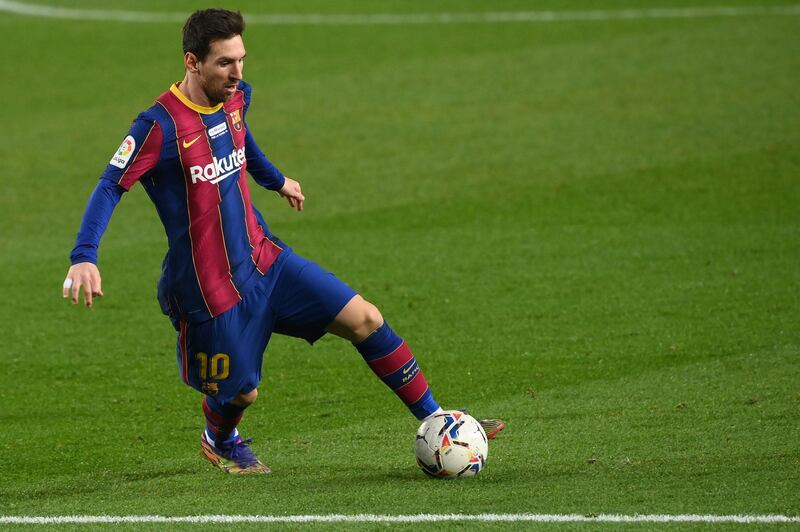 Lionel Messi on the ball during Barcelona's La Liga match against Valencia. AFP