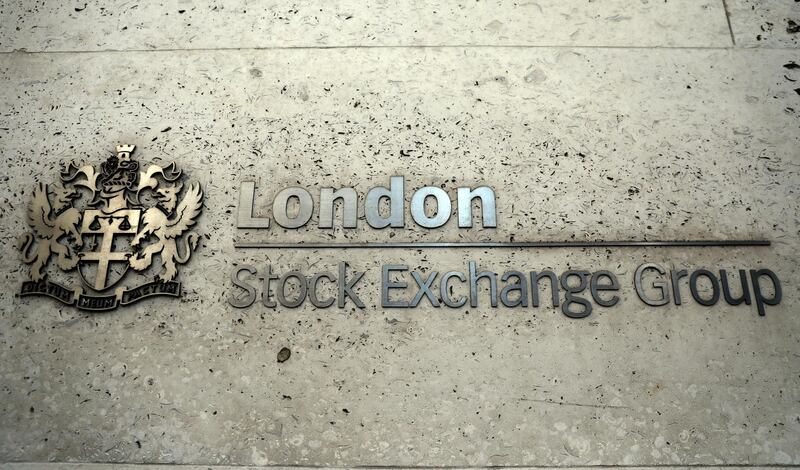 FILE PHOTO: A sign displays the crest and name of the London Stock Exchange in London, Britain August 15, 2017. REUTERS/Neil Hall/File Photo