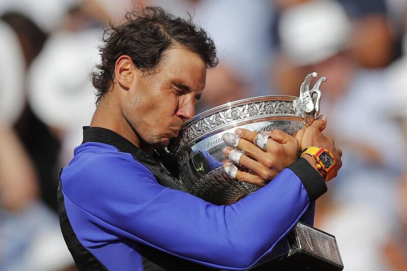 Spain’s Rafael Nadal celebrates winning his 10th French Open title. AP Photo