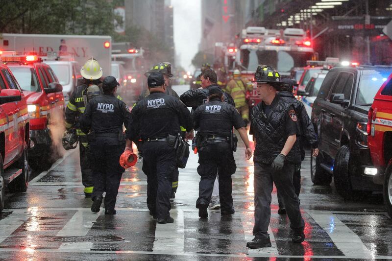 Emergency services first responders arrive at 787 7th Avenue in midtown Manhattan. Reuters