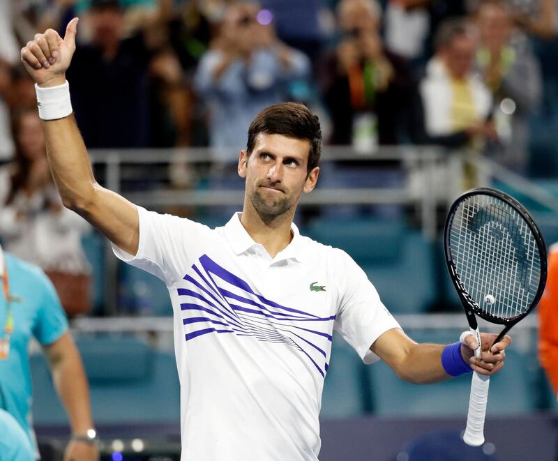 epa07461416 Novak Djokovic of Serbia reacts after defeating Federico Delbonis of the Argentina in three sets during their men's singles match at the Miami Open tennis tournament in Miami, Florida, USA, 24 March 2019.  EPA/JASON SZENES
