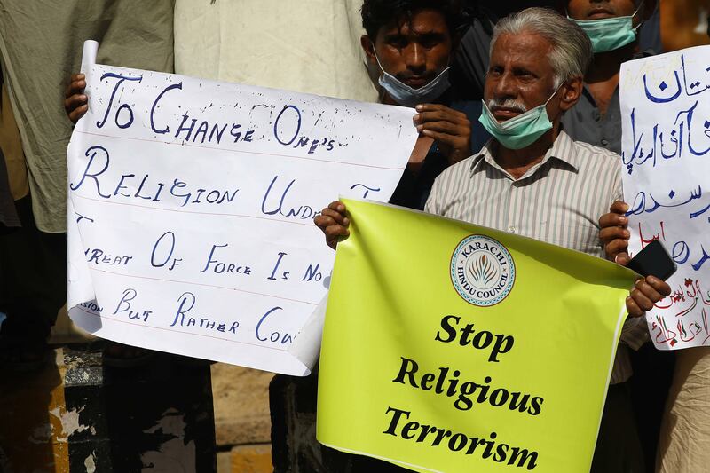 Pakistani Hindu minority members shout slogans during a protest against the attack on their temple in Rahim Yar Khan, in Karachi, Pakistan. EPA