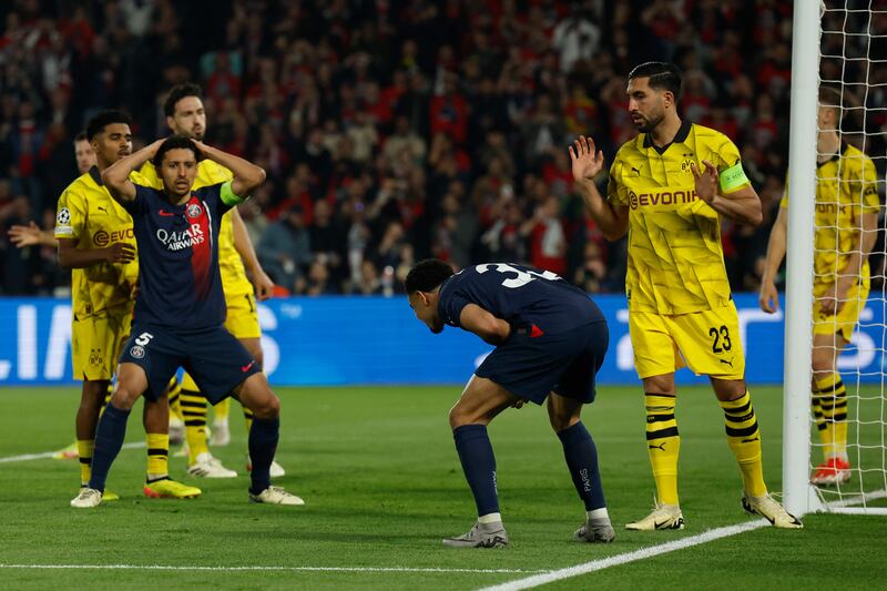 PSG defender Marquinhos and midfielder Warren Zaire-Emery react after missing a chance. AFP