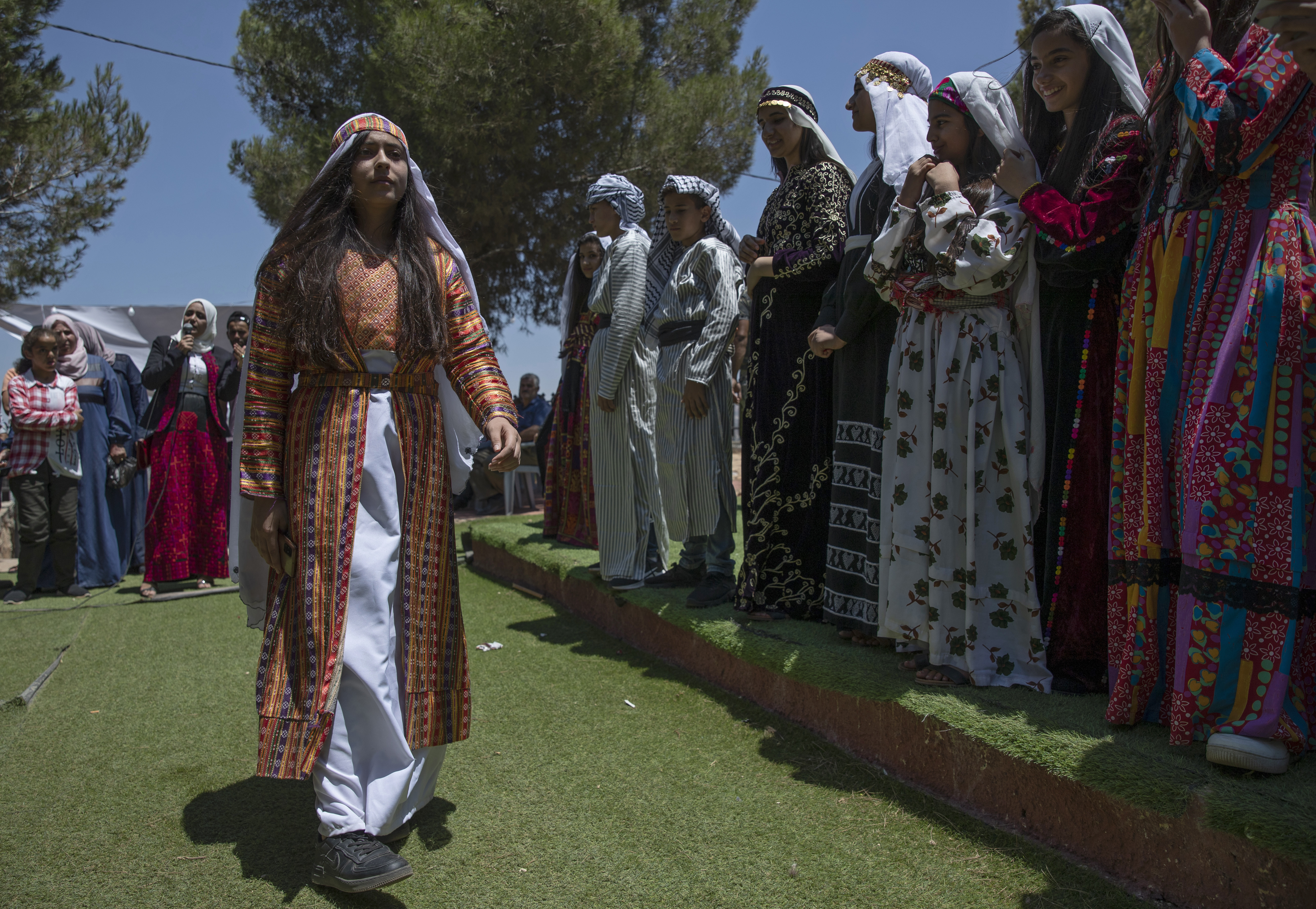 A model during the show on the first day of the market in the West Bank village of Beita.