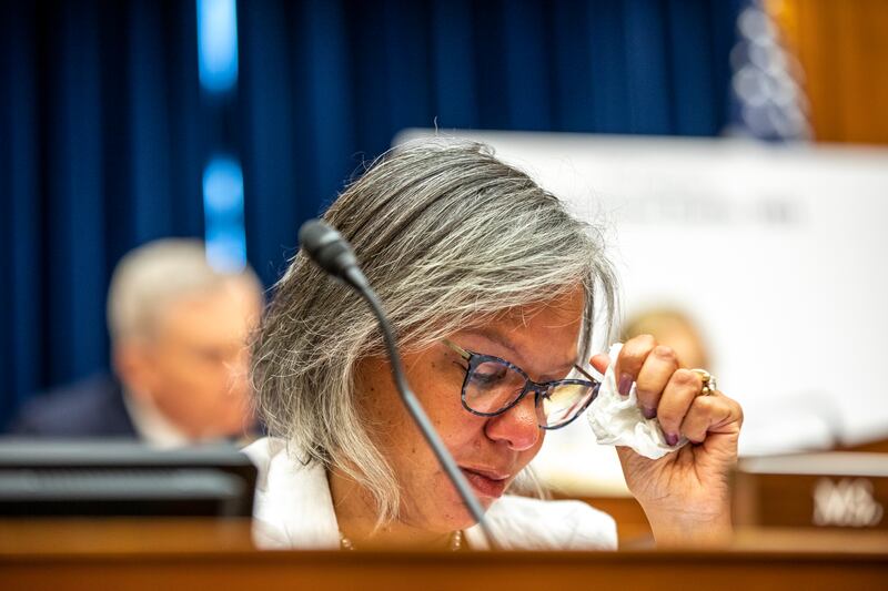 Representative Robin Kelly tears up during the hearing on gun violence. EPA