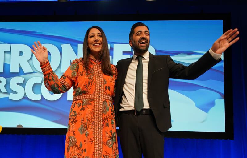 Mr Yousaf with his wife Nadia El-Nakla after his speech at the SNP conference in October. PA