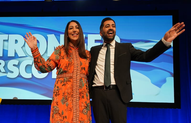 Scottish First Minister Humza Yousaf with his wife Nadia El-Nakla after his speech during the SNP conference. PA