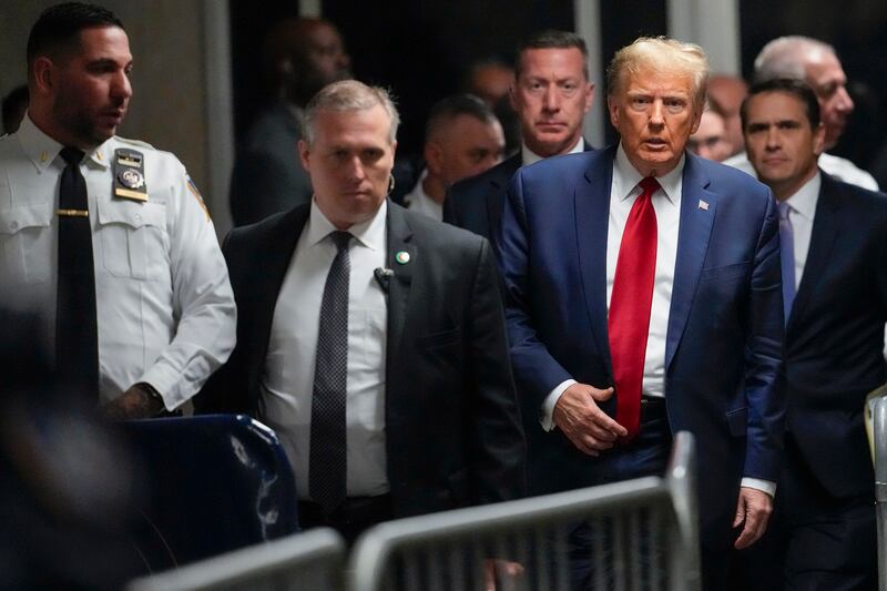 Former president Donald Trump leaves Manhattan criminal court on February 15, 2024, in New York. AP