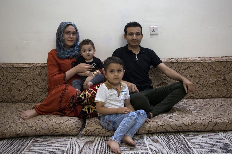 Barkhodan Demir, aged 33, poses for a portrait with his family at home in Erbil, the capital of the Kurdistan Region, Iraq. Demir fled his hometown of Kobane after the so-called 'Islamic State' (IS), also known as 'Isis,' attacked the city in northern Syria in 2014, and destroyed his house. He came to Erbil, where he works as a tailor. He has no hope of being able to return home to Syria after so many years of conflict.
Some 245,810 registered Syrian refugees live in the Kurdistan Region, according to the UNHCR. Many of them have a job, open shops, restaurants, or barbershops. 
World Refugee Day is marked annually on 20 June. According to the UNHCR, more and more refugees today live in urban settings outside refugee camps. EPA