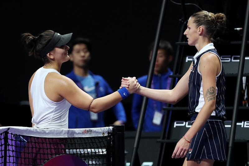 Bianca Andreescu, left, of Canada shakes hands with Karolina Pliskova. Getty