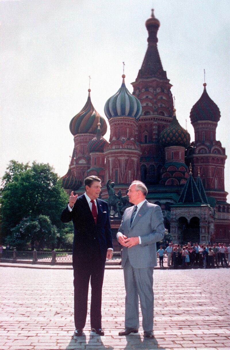 Reagan and Gorbachev talk during a walk in Red Square in Moscow, the former Soviet Union, on May 31, 1988. AP