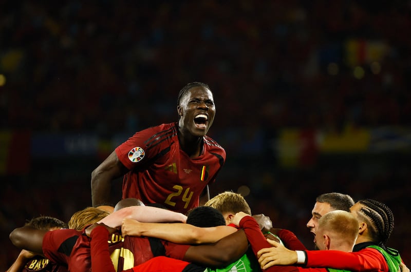 Belgium players celebrate after Romelu Lukaku scores a goal before it was disallowed. Reuters