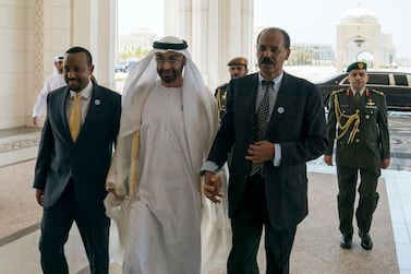 Sheikh Mohammed bin Zayed walks with the leaders of Eritrea and Ethiopia into the Presidential Palace on Tuesday. Courtesy: Wam news agency Twitter