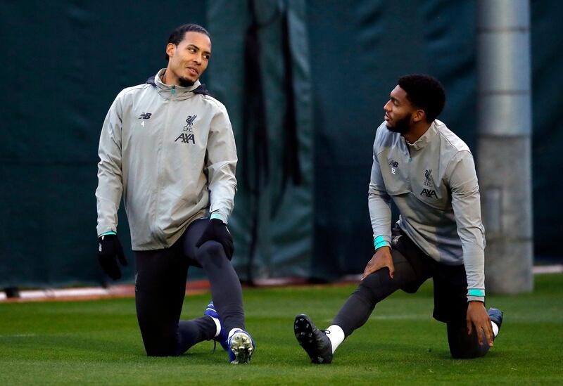 Virgil van Dijk, left, and Joe Gomez during the training session. PA