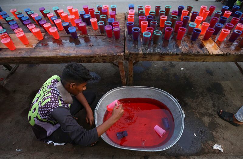 Sugary drinks are prepared for iftar in Karachi, Pakistan. EPA