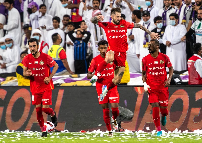 Shabab Al Ahli players celebrate their first goal at the  Pro League Cup final against Shabab Al Ahli at Mohamed bin Zayed Stadium in Abu Dhabi. 