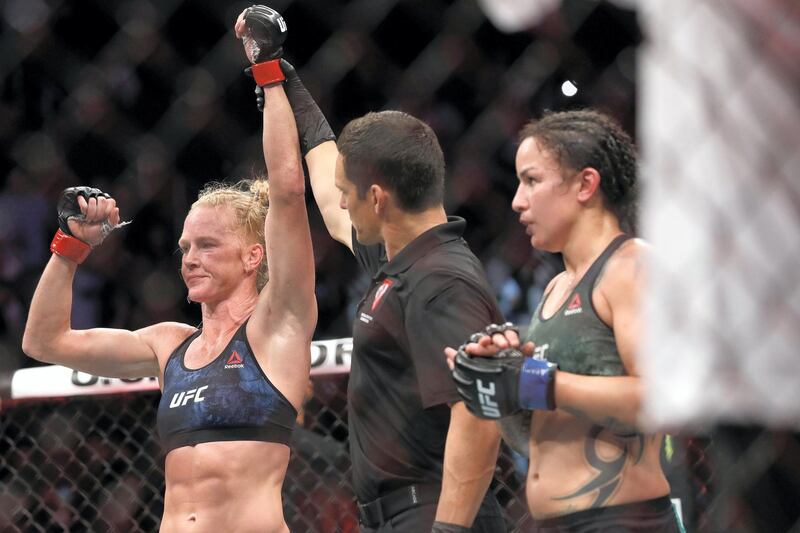LAS VEGAS, NEVADA - JANUARY 18: Holly Holm celebrates after defeating Raquel Pennington by unanimous decision during their bantamweight bout at UFC246 at T-Mobile Arena on January 18, 2020 in Las Vegas, Nevada.   Steve Marcus/Getty Images/AFP