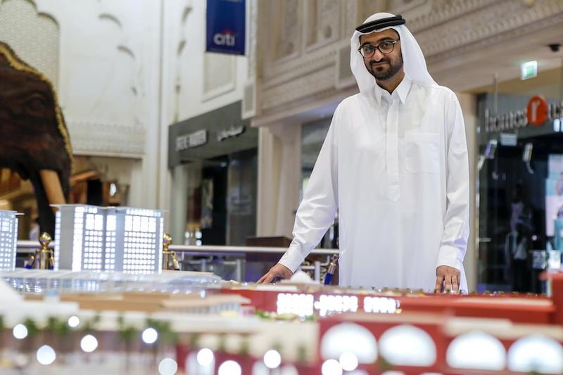 Omar Khoury, head of retail at Nakheel, with a model of the planned extension work to be done on Ibn Battuta Mall. Antonie Robertson / The National