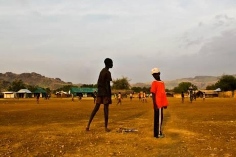 Boys play football on the dirt airstrip in Boma, Jan 20, 2011.

Credit: Jared Ferrie/The National