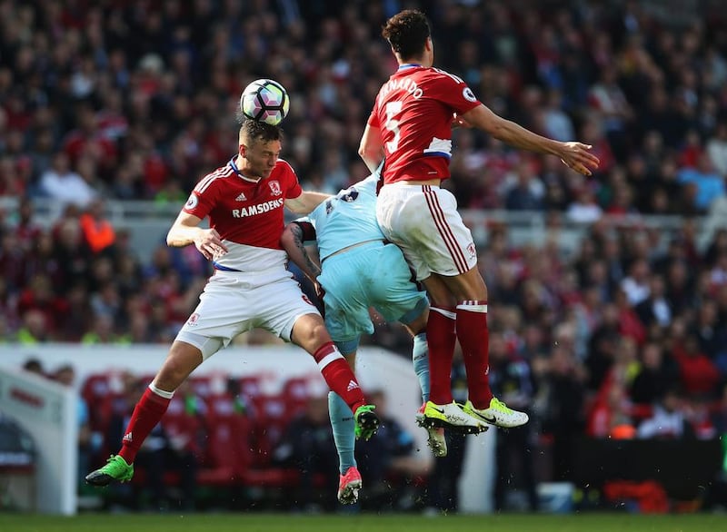 Daniel Ayala of Middlesbrough wins a header over a Burnley defender. Ian MacNicol / Getty Images