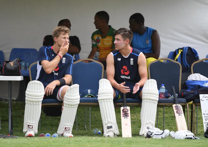 ST JOHN'S, ANTIGUA AND BARBUDA - JANUARY 29:  Rory Burns of England talks with captain Joe Root during Net Practice at Sir Vivian Richards Stadium on January 29, 2019 in St John's, Antigua. (Photo by Shaun Botterill/Getty Images)