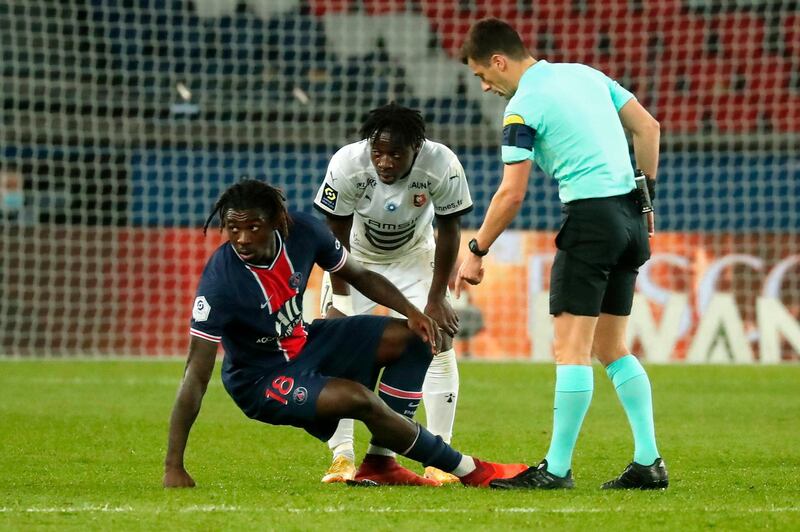 PSG's Moise Kean leaves the pitch after being injured. EPA