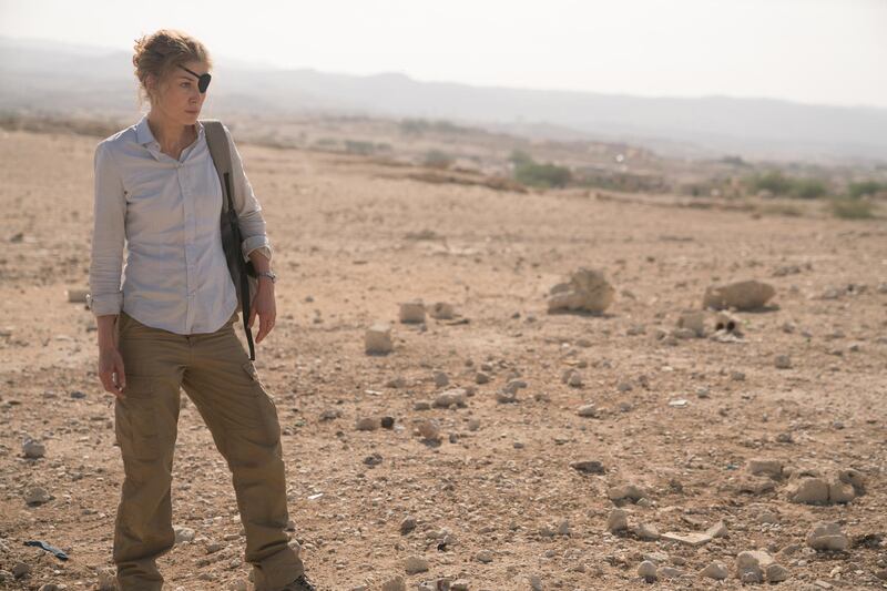Marie Colvin (Rosamund Pike) treks the hot desert in search of the story in A PRIVATE WAR.

Photo credit: Keith Bernstein / Aviron Pictures