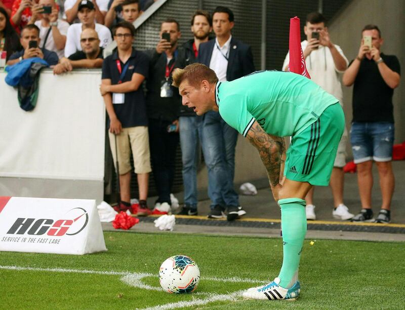 Toni Kroos prepares to take a corner. AFP