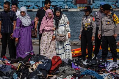 ***BESTPIX*** JAKARTA, INDONESIA - OCTOBER 31: Families of the victims of Lion Air flight JT 610, visit an operations centre to look for personal items of their relatives, at the Tanjung Priok port on October 31, 2018 in Jakarta, Indonesia. Rescuers have recovered bodies, body parts, and personal items in the wreckage, with all 189 passengers and crew feared dead. Lion Air Flight JT 610, travelling from Jakarta to Pangkal Pinang crashed in the Java sea on Monday morning shortly after takeoff. (Photo by Ulet Ifansasti/Getty Images)