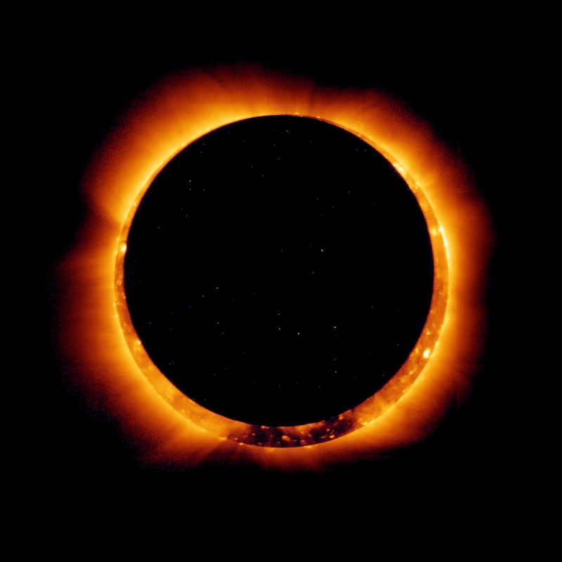 IN SPACE - MAY 20:  In this handout provided by NASA, sun spots are seen as the moon moves into a full eclipse position after reaching annularity during the first annular eclipse seen in the U.S. since 1994 on May 20, 2012.  Differing from a total solar eclipse, the moon in an annular eclipse appears too small to cover the sun completely, leaving a ring of fire effect around the moon. The eclipse is casting a shallow path crossing the West from west Texas to Oregon then arcing across the northern Pacific Ocean to Tokyo, Japan.  (Photo by JAXA/NASA/Hinode via Getty Images)