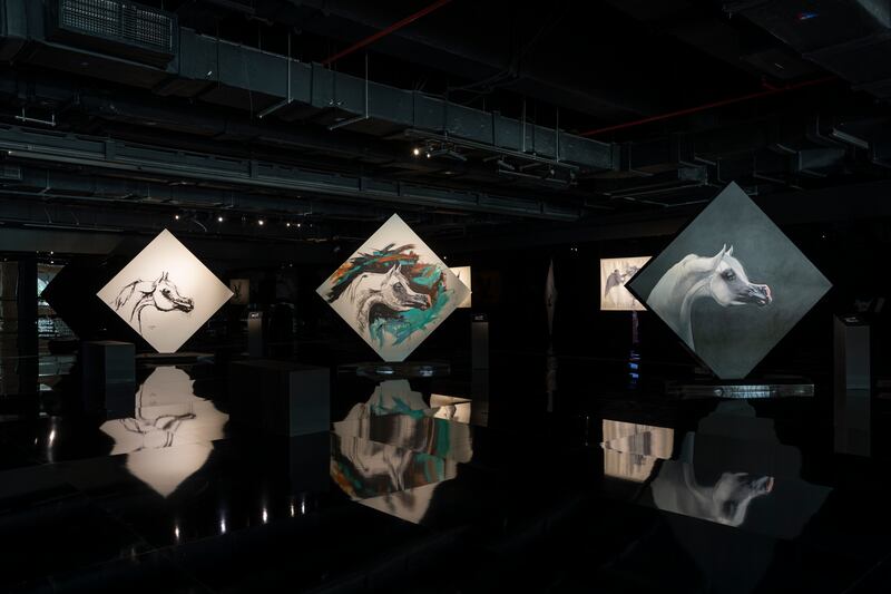 The floors and ceiling of Another Perspective is glossy black, reflecting the exhibited works.