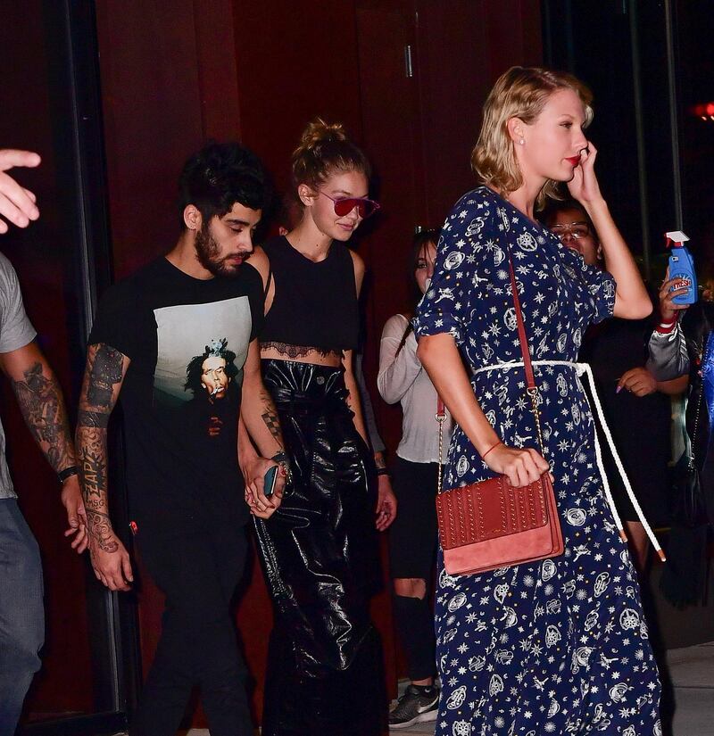 NEW YORK, NY - SEPTEMBER 12:  Zayn Malik, Gigi Hadid and Taylor Swift leave Gigi Hadid's apartment on September 12, 2016 in New York City.  (Photo by James Devaney/GC Images)
